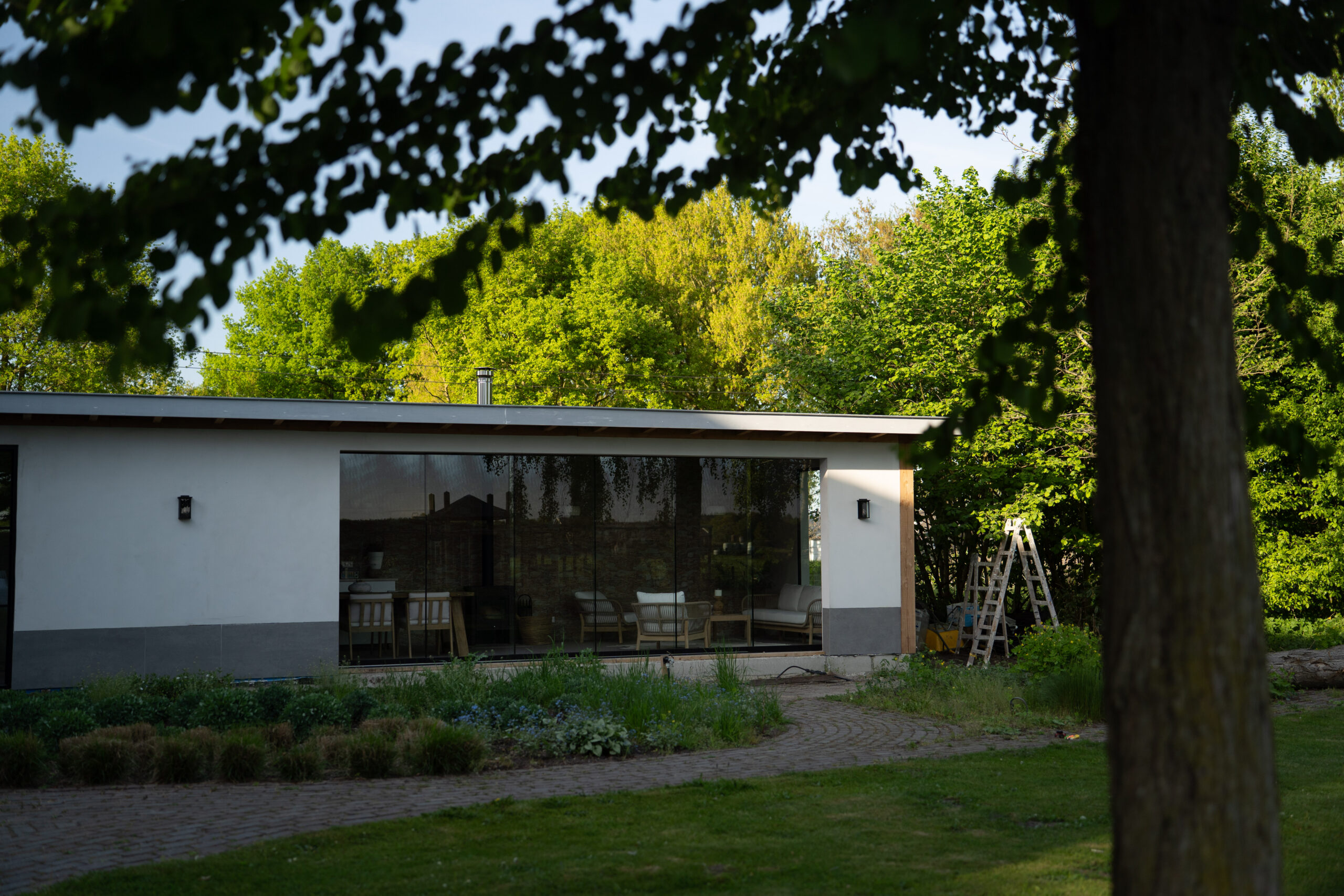 Glazen schuifwand in veranda